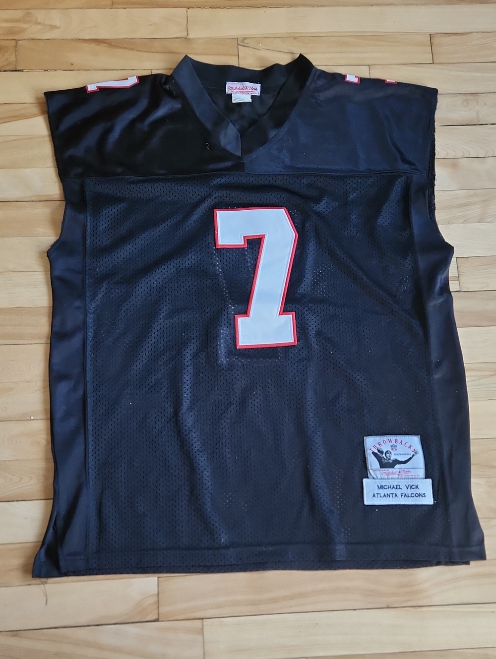 Mitchell & Ness Black Football Jersey with White and Red #7 Mike Vick